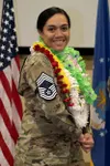 Chief Master Sergeant Jacinta Migo, assigned to the 505th Test &amp; Training Group, Hurlburt Field, Fla. poses with the ceremonial chief master sergeant insignia on her uniform during a cere