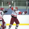 Wasilla forward Jack Reeves celebrates after scoring in the final period of the Warriors’ 3-0 win over the Homer Mariners during semifinal competition a the North Star Conference Championship