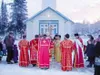 Bishop Nikolai blesses the faithful at St. Nicholas Church in
Eklutna with Holy Water during a procession for the Feast of Saint
Nicholas. Photo courtesy of the Russian Orthodox Diocese of
Al