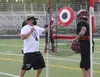 Houston head coach Glenn Nelson works with his quarterbacks during a team practice July 30. Jeremiah Bartz/Frontiersman