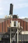 ROBERT DeBERRY/Frontiersman Dirt and rock is loaded into a train
car near Vine Road and the Parks Highway. The Mat-Su Borough
Assembly voted 6-1 to adopt a new set of gravel mining rules.
