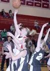 JEREMIAH BARTZ/Frontiersman Wasilla senior Jenna Johnson takes
the ball to the basket after grabbing a steal near the baseline
late in the second quarter of a 66-37 win over South Anchorage a