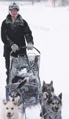 Wasilla High School graduate Ben Harper runs his dogs into the finish of the 2015 Copper Basin 300 Monday afternoon. Harper finished fifth overall behind Allen Moore (winner), Ray Redington, 
