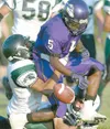 John Wagner/Fairbanks Daily News-Miner After being stripped of
the ball, Lathrop's AJ Allen, right, is taken down by Colony's Matt
Swan Friday evening, August 22, 2008, at Lathrop in Fairbank