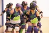 The Denali Destroyer Dolls roller derby team keeps a tight formation while skating around the Chris Stringer Memorial Gym during a practice early in 2012. Saturday, the Dolls, a local women’s