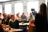 Julie Estey addresses members of the Wasilla Chamber of Commerce at a business lunch Tuesday. MEA officials say the cost of alternatives to an $8 million Parks Highway route will likely cost 