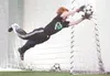 ROBERT DeBERRY/Frontiersman Colony goalkeeper Elliot Gilbert
makes a diving save during a practice at the Wasilla Multi-Use
Sports Complex recently. Gilbert is one of three players vying for
