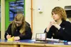 Kyndle Kirby, left, looks over some agenda items while Hannah Hammonds listens to another speaker at Palmer High School's final FFA meeting for the year on Friday, Dec. 4. Kirby is the treasu