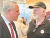Alaska gubernatorial candidate Treg Taylor meets with one of the many veterans in attendance of the Alaska Governor Candidate Forum held on Mar 30. The event was hosted by the Alaska Veterans