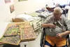 Ed Johnson shows off his puzzles inside his room at the Pioneer Home. photos by Jacob Mann/Frontiersman