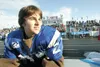 ROBERT DeBERRY/Frontiersman Garrett Stortz, Palmer Moose mascot
and the football program’s No. 1 fan, waits on the sidelines
Saturday for the Palmer High School squad to return from the locke