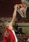 Wasilla's Ray Schafer slams for two points in the second quarter
of Saturday's third place game against Dimond. Photo by TIM
BRODT/Frontiersman.