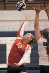 Houston Hawk freshman Alaina Campbell reaches for the ball during a game against the Valdez Buccaneers at the Palmer Jamboree last weekend at Palmer high School. ROBERT DeBERRY/Frontiersman.c