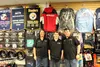 Chery, Alex and Steve Manning operate the Excalibur Sports Wasilla store, which opened Nov. 16. Tim Rockey/Frontiersman
