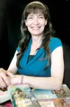 ROBERT DeBERRY/Frontiersman Romance novelist Jackie Ivie has
published six books in her Knights series and is working on the
eighth. Ivie admits that when she’s writing her historical
romance
