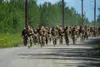 Army and Air Force service members from Joint Base Elmendorf-Richardson (JBER) participated in the Norwegian Foot March June 18, testing their endurance and mental fortitude. U.S Air Force ph