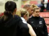 Palmer HIgh School girls basketball head coach Keith Williams, center, addresses his team during a timeout in a game against East Anchorage. Courtesy of Bruce Eggleston/matsusports.net