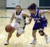 Colony's Sienna Locke drives the ball past Palmer's Amy Chapman
during the first period of Colony's 60-51 win over the Moose. Photo
by JEREMIAH BARTZ/ Frontiersman.