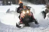 Lawrence Jones throws up snow and gets his skis off the ground
Sunday as he tears off the ice of Big Lake and onto the trail
headed for Nome then on to Fairbanks in the 2,031-mile Iron Dog
sn