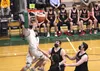 Colony's Patrick McMahon dunks during a win over Wasilla in the Northern Lights Conference title game. Tim Rockey/Frontiersman