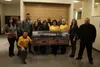 Members of the Wasilla Sunrise Rotary and the Families for the Improvement of Safety and Health gather following the Mat-Su Borough Assembly meeting Feb. 19 in Palmer. The assembly approved t
