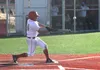 Wasilla's Jacob Hansen drives a pitch into the outfield during a win over Houston. Jeremiah Bartz/Frontiersman
