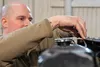 U.S. Air Force Staff Sgt. Evan Cooper, 3rd Maintenance Squadron aerospace ground equipment craftsman, performs maintenance on an A/M 32A-86D “Dash 86 power generator” at Joint Base Elmendorf-