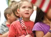 Tyler Coppola and other students in Connie Service’s third-grade class and Jousette McKeel’s kindergarten class at Big Lake Elementary lead the ‘Pledge of Allegiance’ at the start of a Vetera