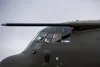 A Royal Air Force pilot assigned to the No. 47 Squadron of the from RAF Brize Norton, England, conducts a preflight check during RED FLAG-Alaska 22-1 at Joint Base Elmendorf-Richardson, Alask