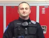 Officer Mike Boradurer is the school resource officer at Wasilla High. Boradurer is in his first year at the school. Photo by Zach Griffin