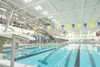 ROBERT DeBERRY/Frontiersman file photo Wasilla’s Karina Barria
pushes off the starting block during the girls 50-yard freestyle
event at the 2009 ASAA/First National Bank State Swimming and
D