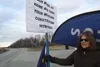 Barbara McDaniel was among a group of people who lined Bogard Road sharing their view of Gov. Mike Dunleavy’s proposed state budget as Dunleavy made an appearance at Everett’s in Wasilla Marc