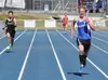 Palmer junior Jared Layton sprints ahead of Colony’s Heita Kitagawa to the finish of the 800-meter relay Saturday at Palmer High. The Moose clocked the best time in the race at the Palmer Inv