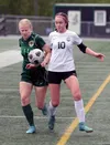 Sophomore Avrie Giegerich, right, battles for possession for Colony during a 2-1 extra-time win over Service in the ASAA Division I state semifinals Thursday at Colony High. Jeremiah Bartz/Fr