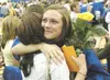 (ROBERT DeBERRY/Frontiersman) 2008 Palmer High School graduate
Sarah Svedin fights back tears as she gets a hug from friend
Rashayne Zimmer after Palmer's graduation ceremony.