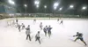 JOHNNY WAGNER/Fairbanks Daily News-Miner Players from the
Fairbanks Ice Dogs and the Alaska Avalanche compete in the first
junior league played outdoors Friday evening at the Big Dipper Ice
A