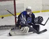 Palmer goalie Mily Christman makes a save Saturday, Dec. 7, 2024, at the Kenai Multi-Purpose Facility in Kenai. Jeff Helminiak/Peninsula Clarion