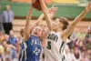 ROBERT DeBERRY/Frontiersman Palmer’s Kasara Brandenburg gets
caught between two Colony Knights during a Moose loss Friday at
Colony High School.