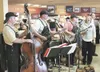 The Carhartt Brothers perform during the grand re-opening
celebration at the Wasilla Carrs/Safeway store. (HEATHER A.
RESZ/Frontiersman)