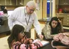 Palmer Junior Middle School teacher Steve Montgomery offers individual instruction to students Ellisa DeBoer and Emily McNiven in MATH 180, a class designed as a supplment to students' grade-