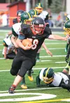 Tanner Barclay runs for a first down during Houston's game against the Seward Seahawks at Houston High School. ROBERT DeBERRY/Frontiersman.com