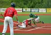 Chugiak-Eagle River's Aaron Schackleford slides into home underneath the tag of Mat-Su catcher Andy Thomas during a 7-6 loss to the Miners June 28 at Lee Jordan Field in Chugiak. Jeremiah Bar