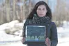 Jen Tanner holds a photograph of her dog, Denali. Denali was shot and killed by a pellet gun about three weeks ago. There were no witnesses and no one has come forward with information about 