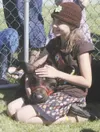 Clair Howell, 9, said she enjoyed petting this calf the best at
a small petting zoo that was part of Thursday’s Agriculture
Appreciation Day at the Palmer Center for Sustainable Living. (GREG