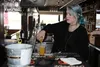 Becca Hochanadel prepares a drink Wednesday at Everett's. She started work at the fine dining restaurant in late 2020. Dan Shearer/Frontiersman