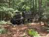 The Project Origin vehicle, a surrogate for Army Robotic Combat Vehicles, is seen through a night vision lens at the Joint Readiness Training Center at Fort Polk, Louisiana, in September 2021