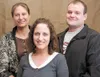Kelly Tatum, center, is alive today thanks to friend Sarah Nielsen and boyfriend Wade Schachle. Tatum went into cardiac arrest on Jan. 29 during a soccer game at the Curtis D. Menard Memorial