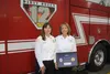 Heather Wilson (left) and Therese Gochanour (right) at Anchorage Fire Department Station 12. Jacob Mann/Frontiersman