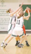 Colony’s Kira Garrod and Allie Grazilus double team Wasilla
guard Jenna Johnson during the Knight’s win over Wasilla Friday.
ROBERT DeBERRY/Frontiersman