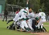 Mat-Su starting pitcher Justin Vernia takes a selfie from the top of the pile, as the Miners celebrate winning an Alaska Baseball League championship. The Miners used a 9-3 win over the Penin